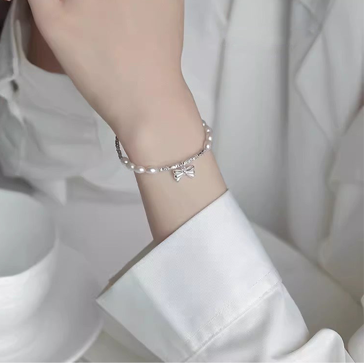 S925 sterling Silver and Freshwater Pearls with Ribbon shaped bracelet