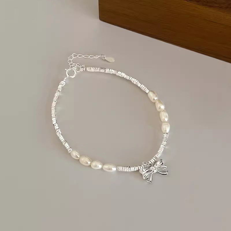 S925 sterling Silver and Freshwater Pearls with Ribbon shaped bracelet