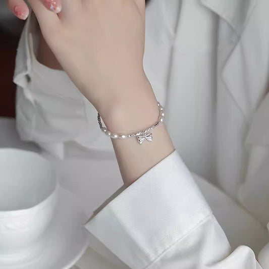 S925 sterling Silver and Freshwater Pearls with Ribbon shaped bracelet